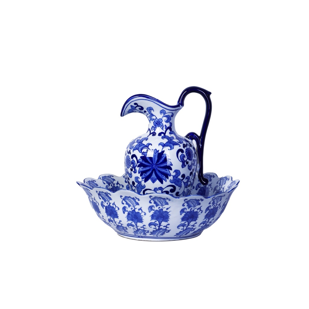 Teapot with a blue porcelain saucer.